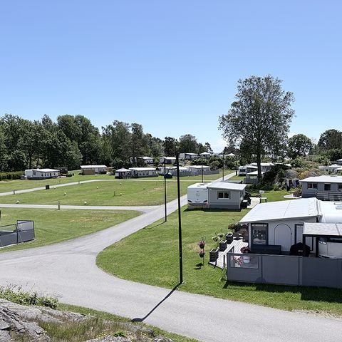 Campingvogner med fortelt på Storejordet.